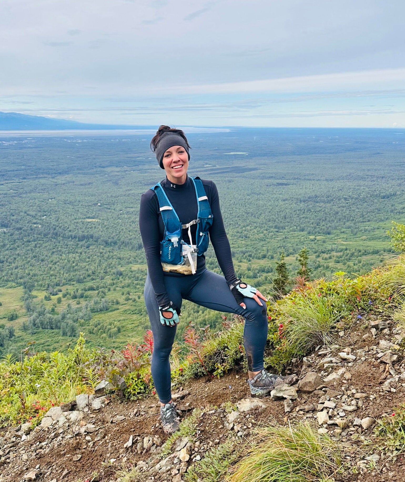 Erika Dominick outdoors in Alaska, founder of Summit Wellness & Spa